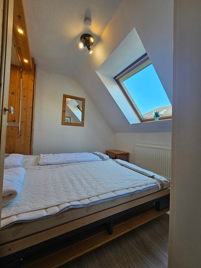 Appartement in Scharbeutz - Pinamar - Schlafzimmer mit Schrankbett untere Ebene