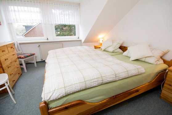 Ferienwohnung in Rettin - Ferienhof Hansen Sanddorn - Schlafzimmer mit Doppelbett