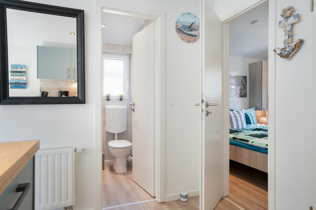 Ferienhaus in Scharbeutz - Casa del Mar Scharbeutz - Sauna kostenlos - 1 kleiner Hund willkommen - umz&auml;unter Garten - Bild 11