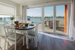 Maisonette Fewo Ostseeflair by Seeblick Ferien ORO, erste Wasserreihe, E-S&auml;ule