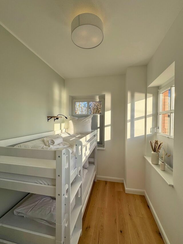 Ferienwohnung in Fehmarn OT Orth - Piratenschiff - First-Class Auszeit mit privaten Spa, Kamin, Meerblick & Gym - Bild 13